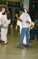 Community members dancing at cultural event