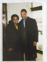 Photograph of Enola Mixon with Rev. Jessie Jackson