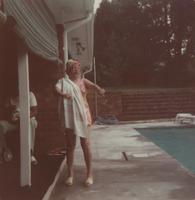 Unidentified woman by a swimming pool