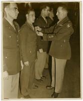 Colonel Younts awards a medal