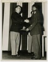 Lieutenant Colonel Bowlin receiving his discharge papers