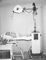 Interior of doctor's office with large equipment