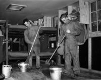 Men Mopping the Barracks