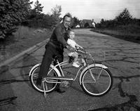 Man and Child on a Bicycle