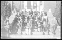 Group of boys and men outside Cone Memorial YMCA