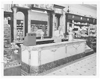 C.C. Fordham Jr. behind the soda counter at Fordham Drug Store