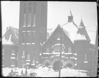 Snow-covered view of West Market United Methodist Church in downtown Greensboro