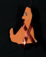 Red ribbon on orange pin