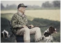 Joseph Bryan with hunting dog and rifle