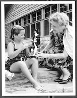 Martha Blakeney Hodges with the daughter of photographer Hugh Morton