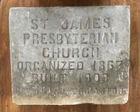 Chair and cornerstone of St. James Presbyterian Church