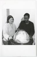 Students Examining a Globe, 1997