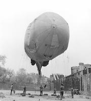 Royal Air Force servicewomen inflate balloon