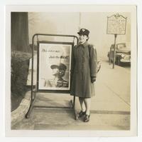 Adeline Sears LaPlante posing with WAAC recruitment poster, North Carolina