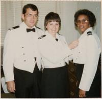 Service members in mess dress uniform