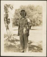 Ann Holder-Andavall posing in WAVES coveralls