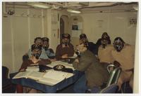 Photograph of the USS Yellowstone (AD-41) crew in gas masks
