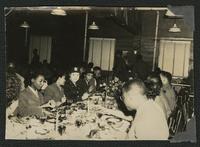 African American WACs and soldiers dining