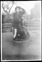 Myrtle Hanke on turtle sculpture, circa 1945