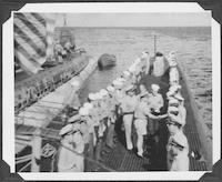 Servicemen receiving papers aboard ship, circa 1946