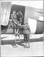Three WACs exit Douglass C-54 Skymaster