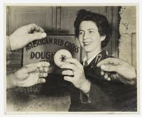 Elizabeth Williams hands out doughnuts