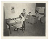 Mary Ellen West at work in office