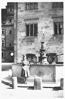 Nancy Riddle Hinchliffe beside a fountain