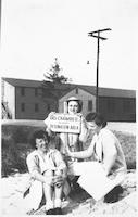 WACs in front of gas chamber sign