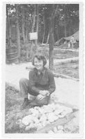 Jane Brister by a campfire