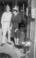 Ruth Kent Petker holding hands with serviceman