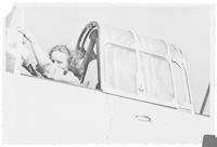 June Neely Baker in airplane cockpit
