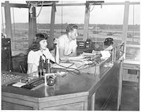 Bobbi and Roger Earp in air traffic control tower