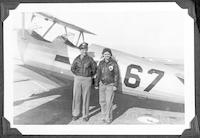 Susie Winston Bain and pilot beside airplane