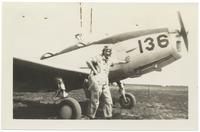 Dorothy Avery beside a plane