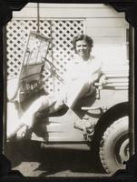Esther Gilbert in a jeep, Manila, Philippines