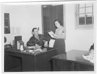 WAC with lieutenant at desk